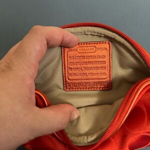 Coach/ estee lauder cosmetic pouch